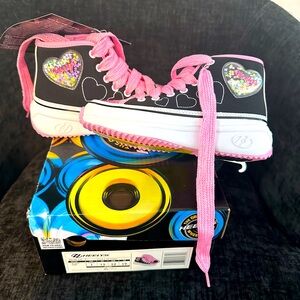 Black and Pink Heelys.